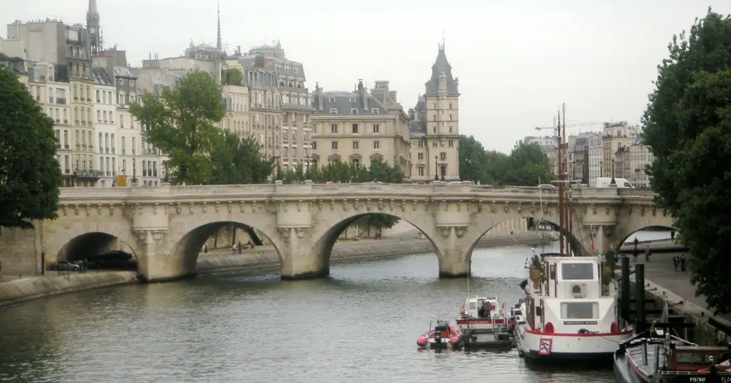 Pont Neuf bridge spans the Seine River in central Paris.