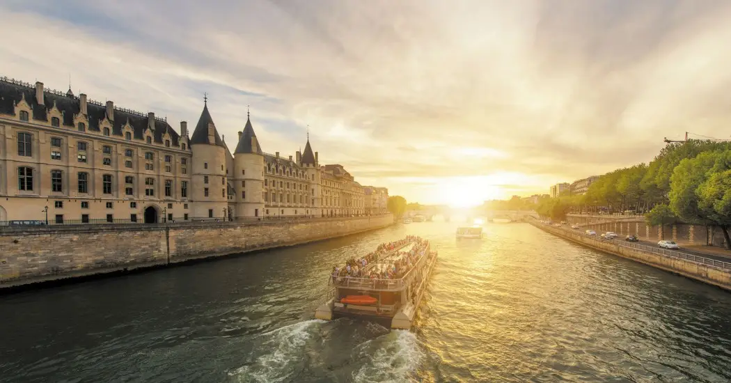 Morning Cruise on the Seine River near the Conciergerie in Paris.